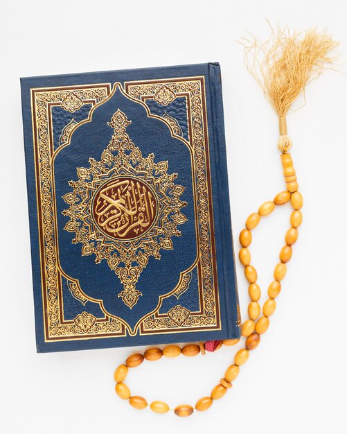 Top view islamic new year with quran book
