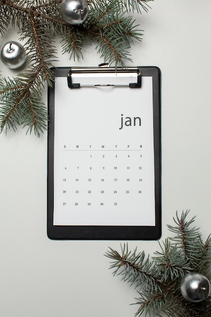 Top view january calendar and globes