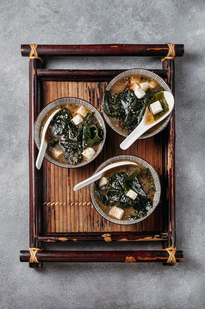 Top view japanese food in bowls arrangement