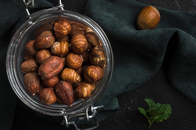 Top view jar filled with organic hazelnuts