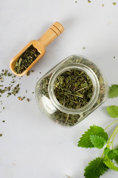 Top view jar with herbs on the table