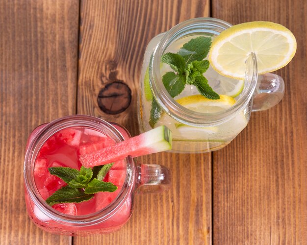 Top view jars with fruits flavor drinks