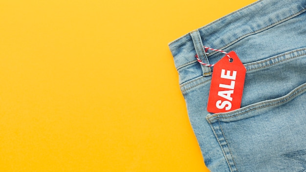 Top view jeans with sale label copy space