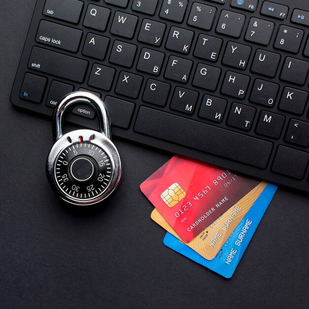 Top view of keyboard with credit cards and lock