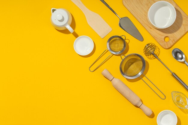 Top view kitchen utensils arrangement with copy space