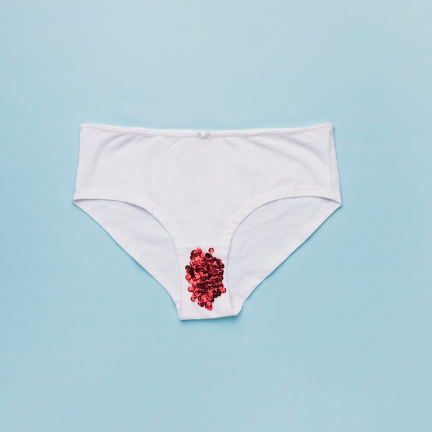 Free photo top view knickers with red sequins