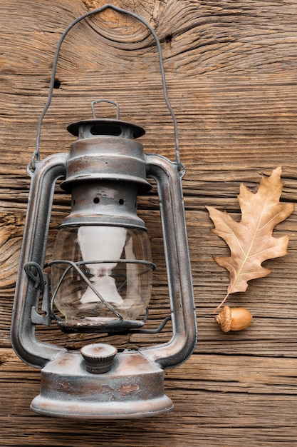 Top view of lantern with autumn leaves