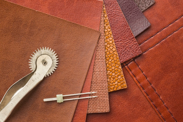 Free photo top view of leather with needle