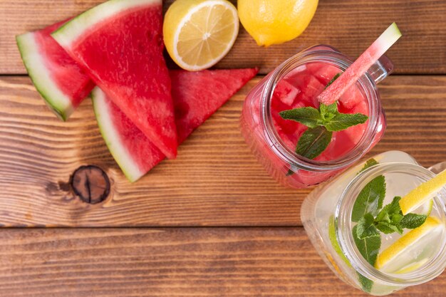 Top view lemon and watermelon drinks