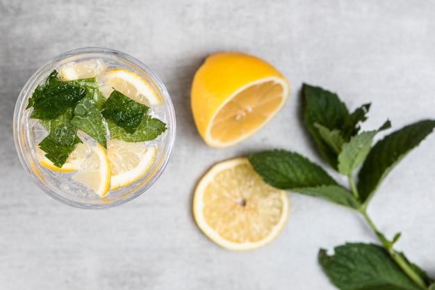 Top view of lemonade on wooden background