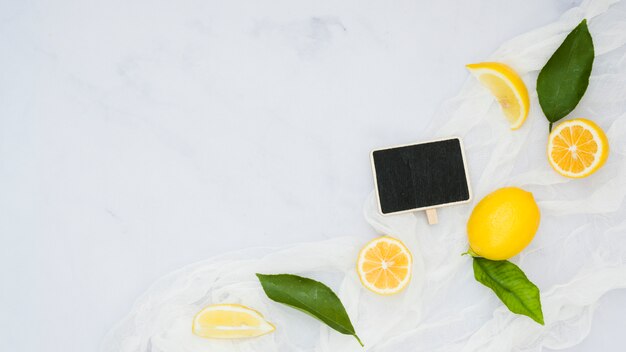 Top view lemons with blackboard