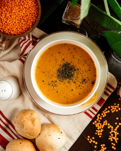 Top view lentil soup traditional azerbaijani soup with lemon and dry mint