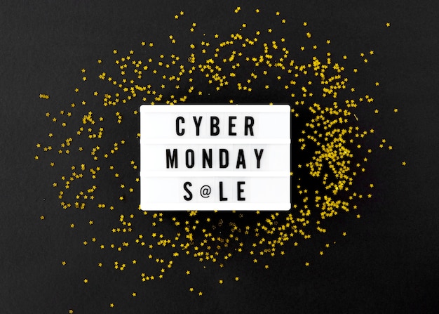 Free photo top view of light box for cyber monday with gold glitter