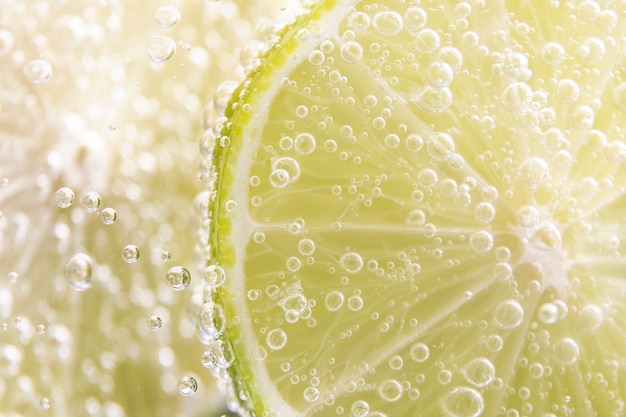 Top view lime and sparkling water