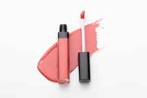 Free photo top view lipstick with brush