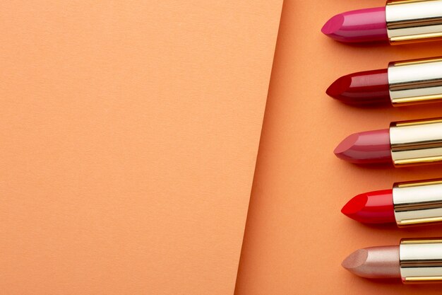 Top view lipsticks arrangement with copy space