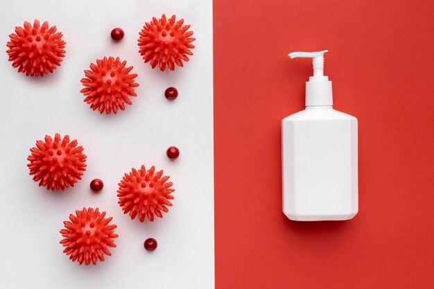 Top view of liquid soap bottle with viruses