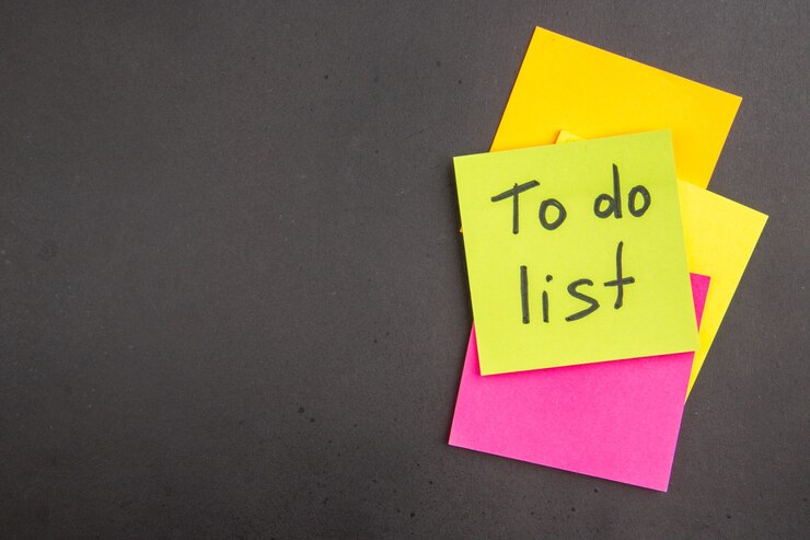 Free Photo top view to do list written on green sticky note colorful sticky notes on dark with copy place