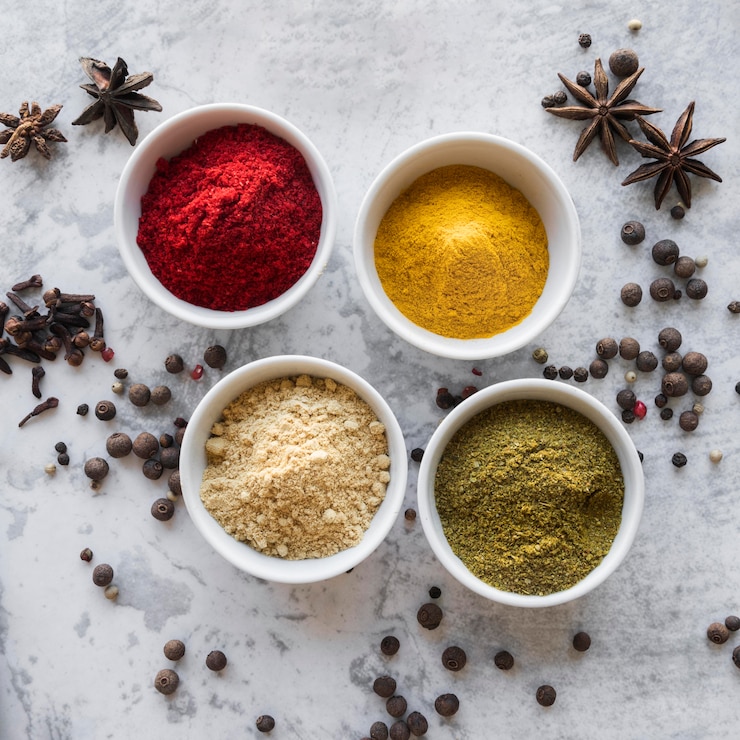 Free Photo top view little bowls with spices