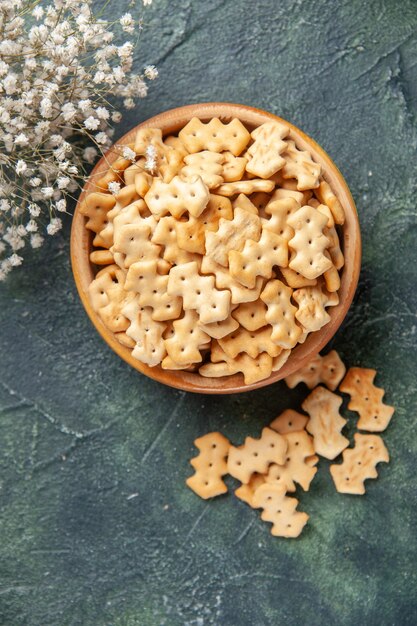 Top view of little salted crackers in bowl