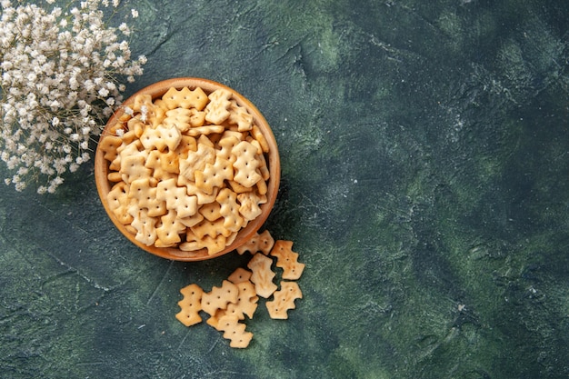 Top view of little salted crackers in bowl