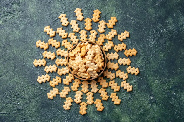 Top view of little salted crackers in bowl