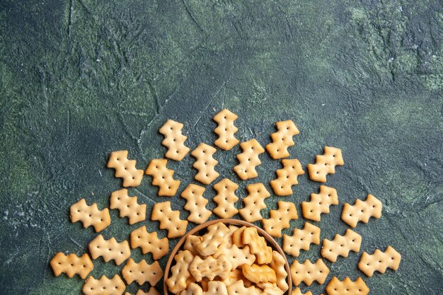 Top view of little salted crackers in bowl