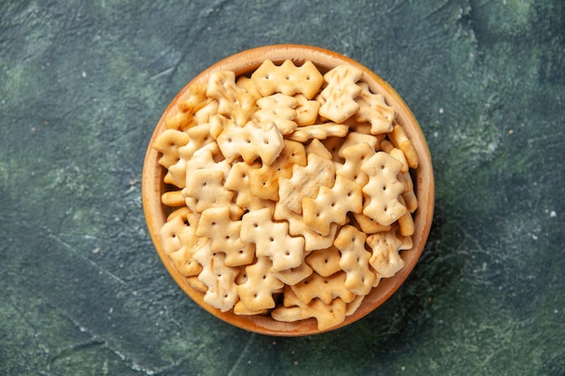 Top view of little salted crackers in bowl