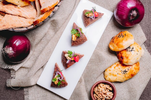 Top view liver pate with onion and bread