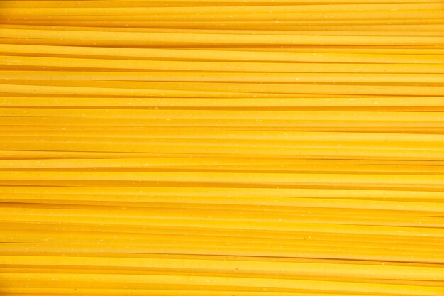 Top view long italian pasta raw on light background