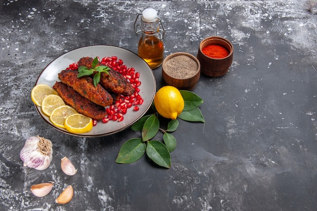 Top view long meat cutlets with seasonings