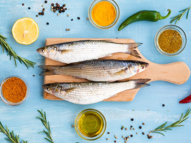 Top view mackerels on a wooden board