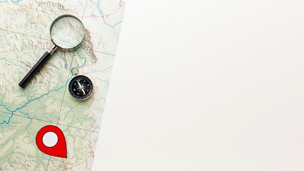 Top view magnifying glass and compass