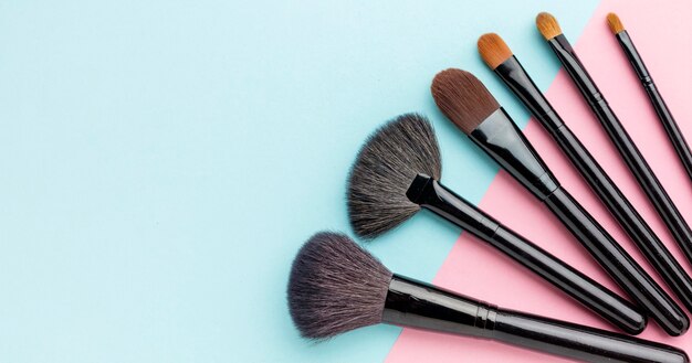 Top view make-up brushes with copy space