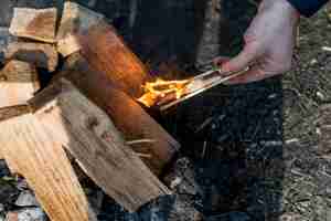 Free photo top view man making bonfire