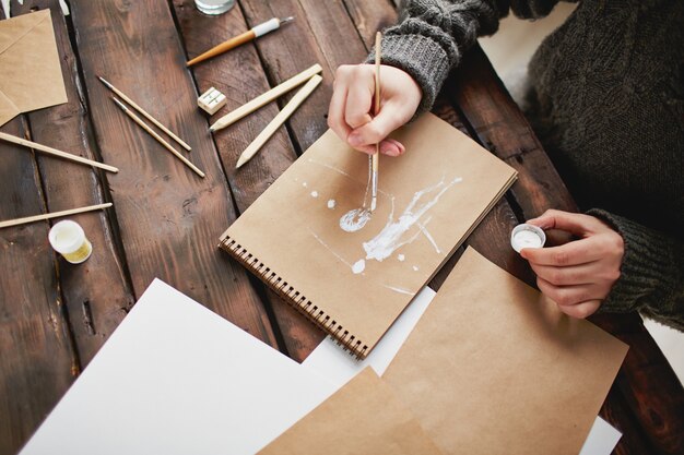 Top view of a man painting