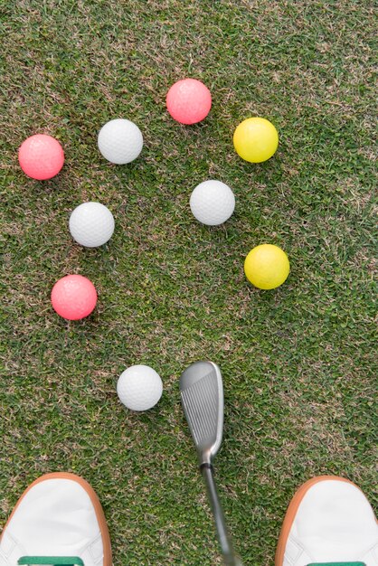 Top view man playing golf on course