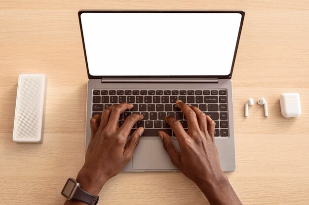 Top view man using his laptop