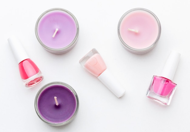 Free photo top view manicure products with candles