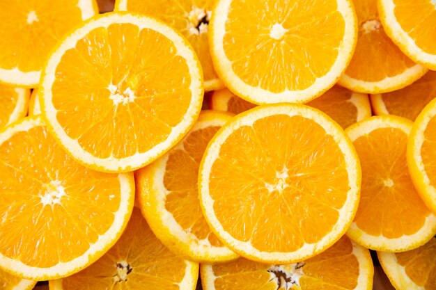 Top view of many round orange slices