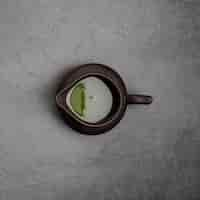 Free photo top view of matcha tea in pourer