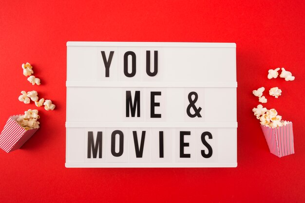 Top view me and you cinema lettering on red background