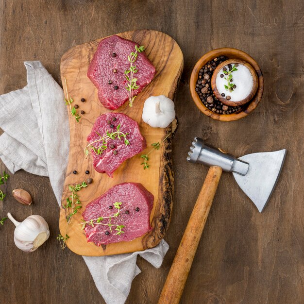 Top view of meat with garlic