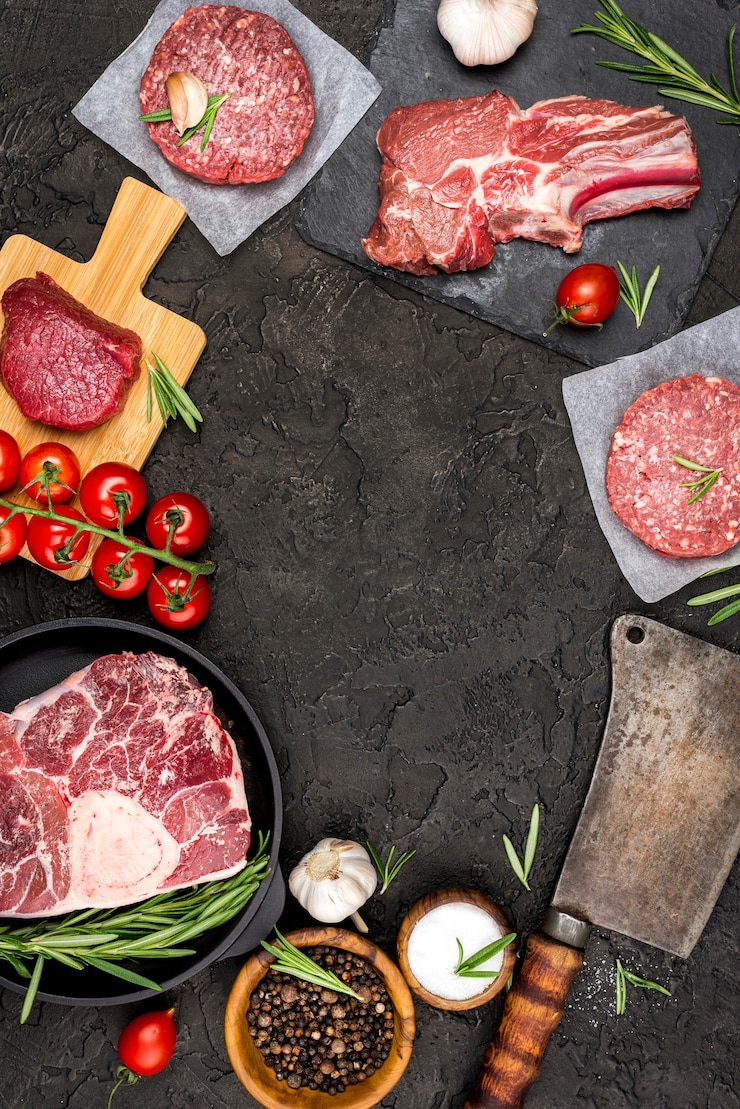 Free Photo top view of meat with tomatoes and herbs