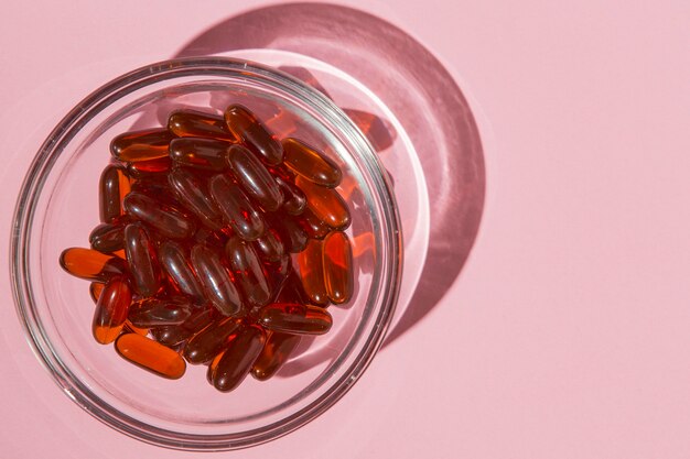 Top view medical capsules in a bowl