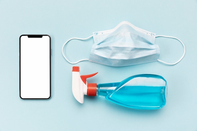 Top view medical mask with blank phone