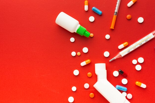 top view medical pills and syringes