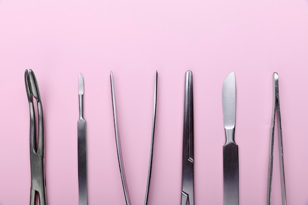 Top view of medical scalpel with other instruments for medicine