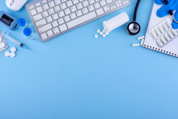Free Photo top view medicine and keyboard arrangement