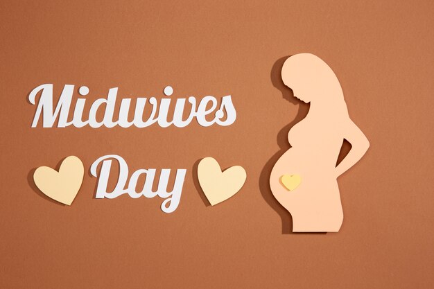 top view midwives day celebration with pregnant woman